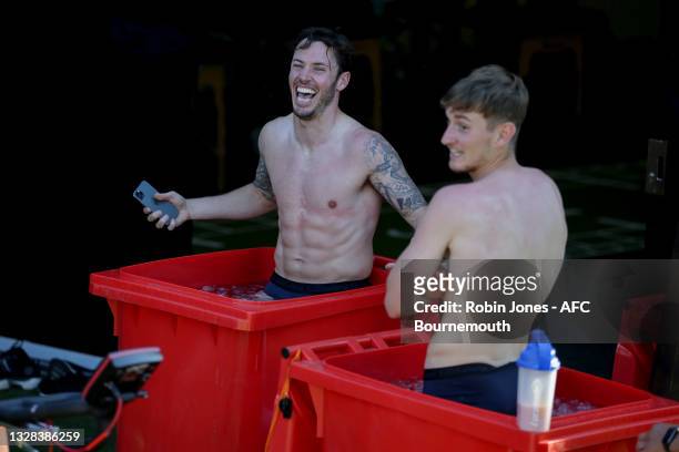 Adam Smith and David Brooks of Bournemouth taking an ice bath at the end of the day during a pre-season training session at the La Quinta Football...