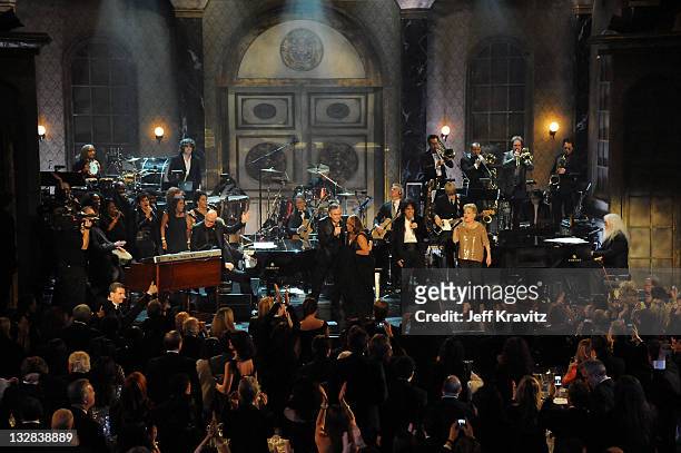 Musician Paul Shaffer, inductees Neil Diamond, Darlene Love and Alice Cooper, singer Bette Midler and inductee Leon Russell perform onstage at the...