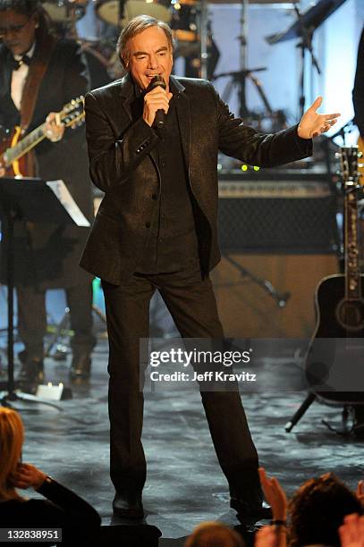 Inductee Neil Diamond performs onstage at the 26th annual Rock and Roll Hall of Fame Induction Ceremony at The Waldorf=Astoria on March 14, 2011 in...