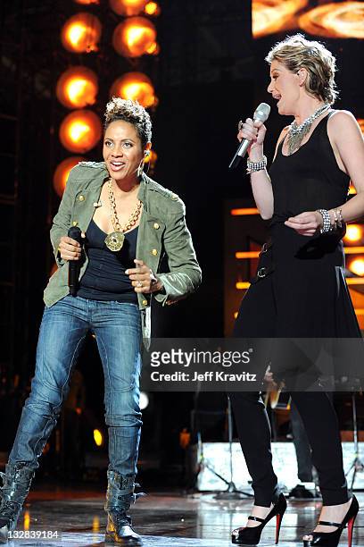 Rapper MC Lyte and musician Jennifer Nettles of Sugarland perform onstage during "VH1 Divas Salute the Troops" presented by the USO at the MCAS...