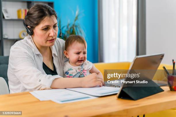 Baby Crying At Computer Crying Office Baby Photos and Premium High Res Pictures - Getty Images