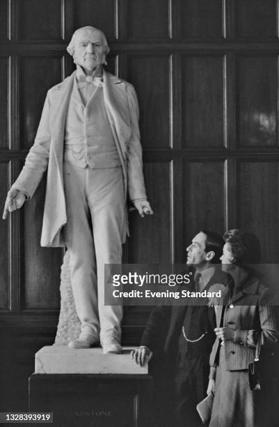 British Liberal leader Jeremy Thorpe and his wife, pianist Marion Stein admire a statue of former Liberal Prime Minister William Ewart Gladstone in...