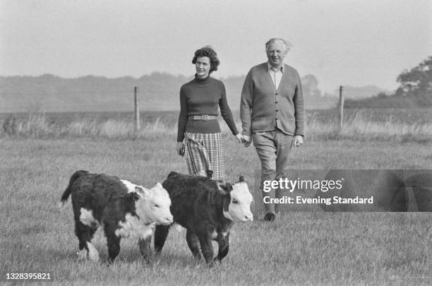 British Conservative politician Jim or James Prior walking with his wife Jane in the country in the run-up to the October general election, UK, 30th...