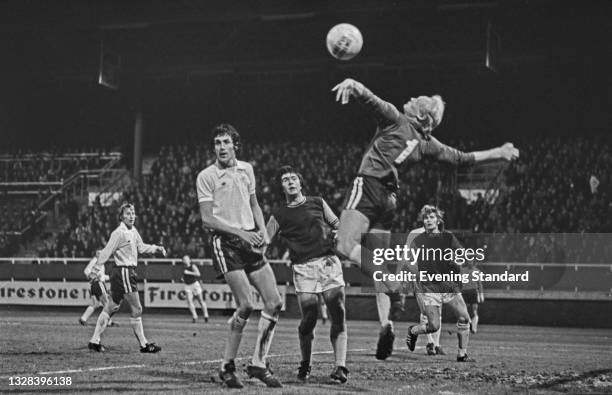 English footballer Alan Mullery of Fulham FC and Billy Bonds of West Ham United during a League Cup 3rd round match at Craven Cottage in London, UK,...