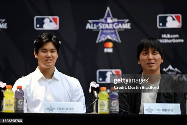 Shohei Ohtani of the Los Angeles Angels speaks to the media during the Gatorade All-Star Workout Day at Coors Field on July 12, 2021 in Denver,...