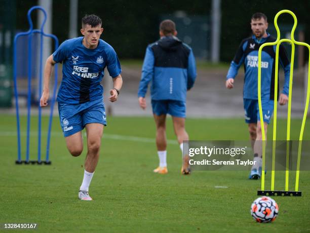 Kelland Watts runs with the ball during the Newcastle United Pre Season Training Session at Queen Ethelburga's Collegiate on July 12, 2021 in York,...