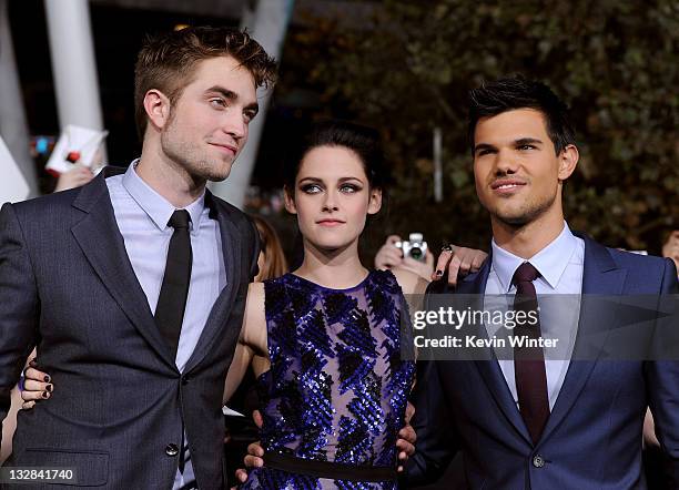 Actors Robert Pattinson, Kristen Stewart, and Taylor Lautner arrive at the premiere of Summit Entertainment's "The Twilight Saga: Breaking Dawn -...