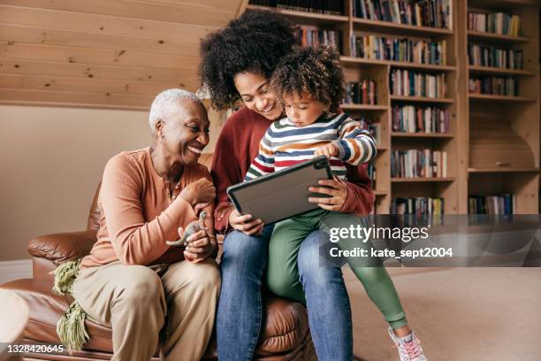 how smart home tech can help older adults - diverse family stock pictures, royalty-free photos & images