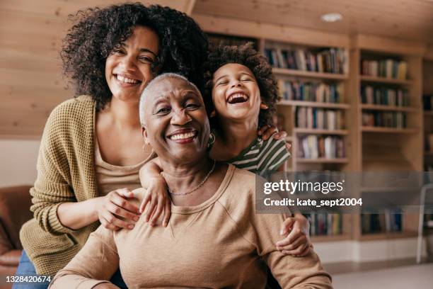 assisted living lifestyle - mother daughter adult black stock pictures, royalty-free photos & images