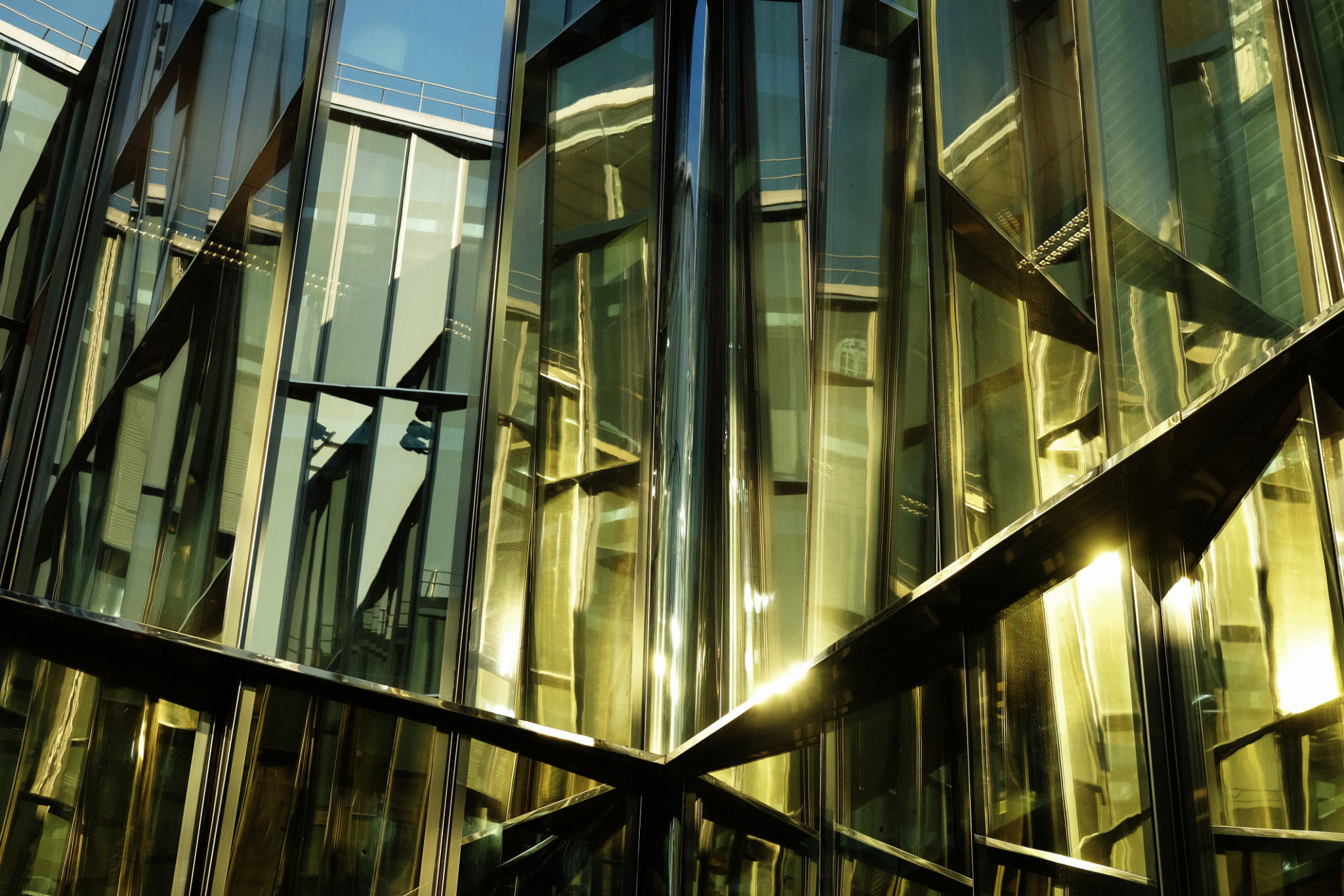 modern business center with big glass wnindows, summer day modern business center with big glass wnindows, summer day