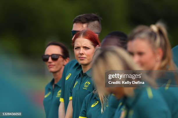 Kendra Hubbard and athletes look on during an Athletics Australia training camp at Barlwo Park on July 13, 2021 in Cairns, Australia.