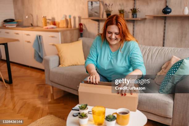 Open Large Box Opening A Large Box Photos and Premium High Res Pictures - Getty Images