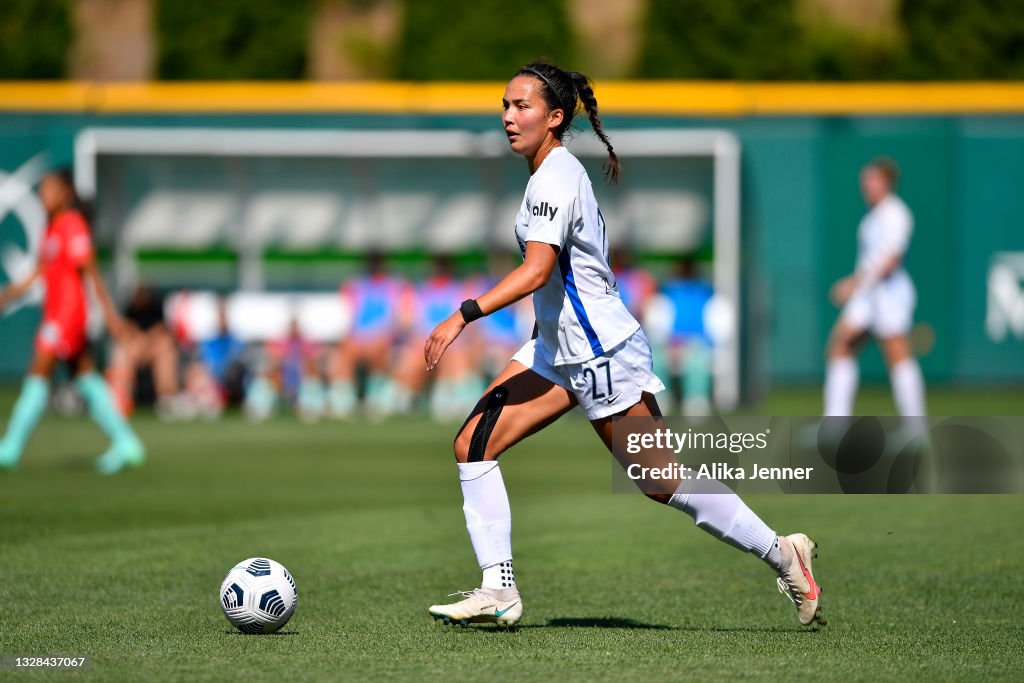 Sam Hiatt of OL Reign controls the ball during the game against... News ...
