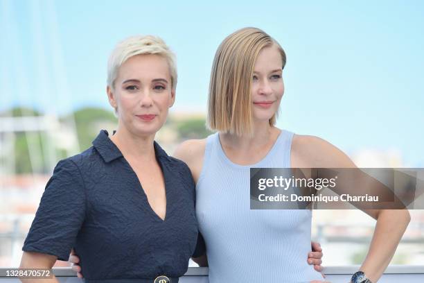 Chulpan Khamatova and Yulia Peresild attend the "Petrov's Flu" photocall during the 74th annual Cannes Film Festival on July 13, 2021 in Cannes,...