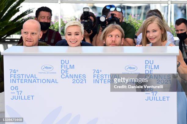Yury Kolokolnikov, Chulpan Khamatova, Ivan Dorn and Yulia Peresild attend the "Petrov's Flu" photocall during the 74th annual Cannes Film Festival on...
