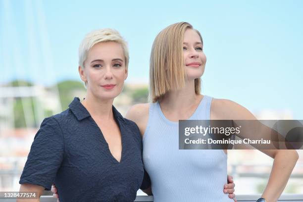 Chulpan Khamatova and Yulia Peresild attend the "Petrov's Flu" photocall during the 74th annual Cannes Film Festival on July 13, 2021 in Cannes,...