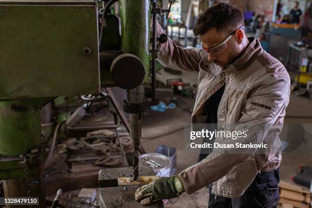 few adjustments and the job is done - aluminum shavings stock pictures, royalty-free photos & images