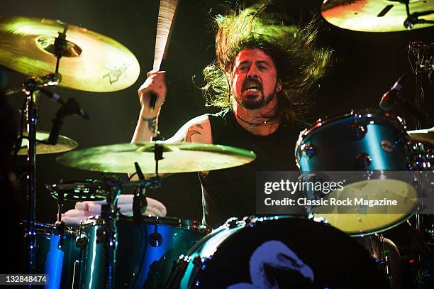 Dave Grohl of American rock band Them Crooked Vultures, live on stage at the Hammersmith Apollo, December 17 Hammersmith. Also famous for being in...