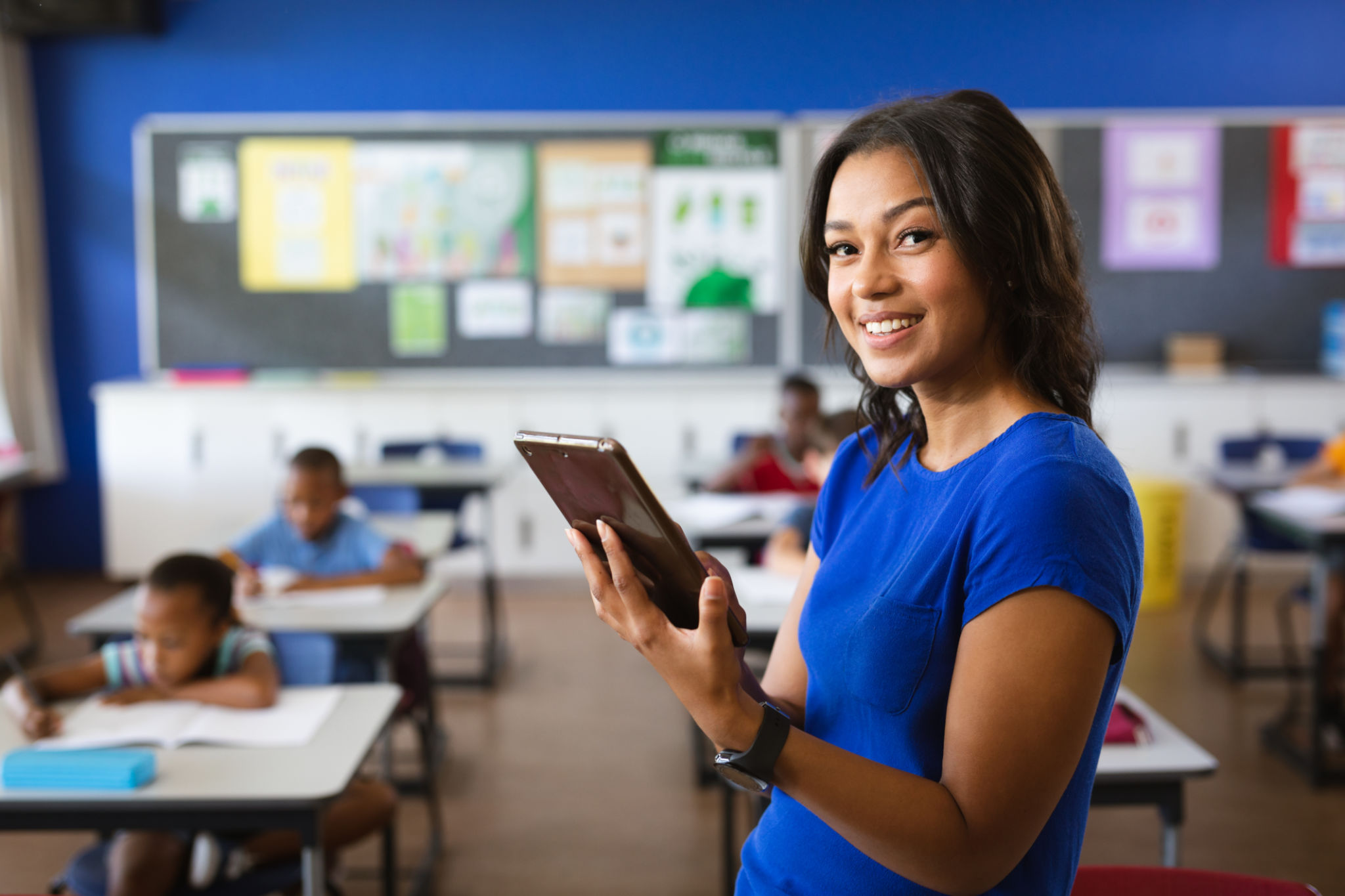 teacher using tablet