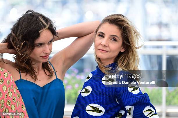 Clara Ponsot and Clotilde Courau attend the "Les Heroiques/The Heroics" photocall during the 74th annual Cannes Film Festival on July 13, 2021 in...