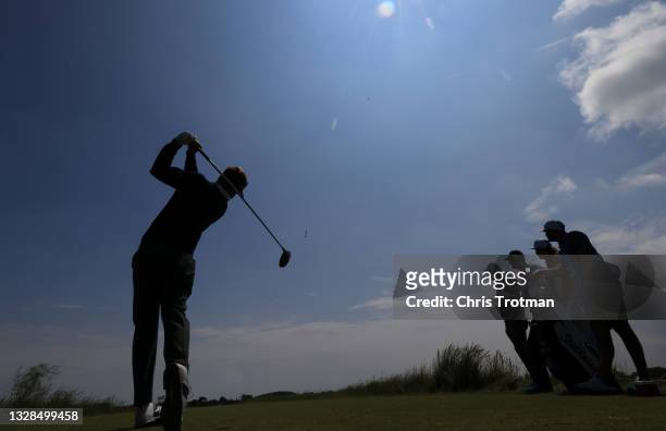 Marc Leishman of Australie tees off on the 4th hole during a practice round ahead of The 149th Open at Royal St George’s Golf Club on July 13, 2021...