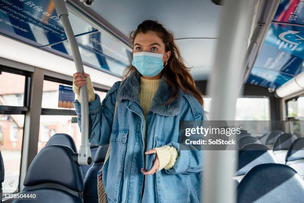 Got Off Woman Getting Off Bus Photos and Premium High Res Pictures - Getty Images