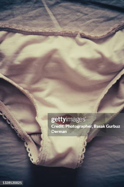 menstruation blood spot on an underwear - period blood stockfoto's en -beelden