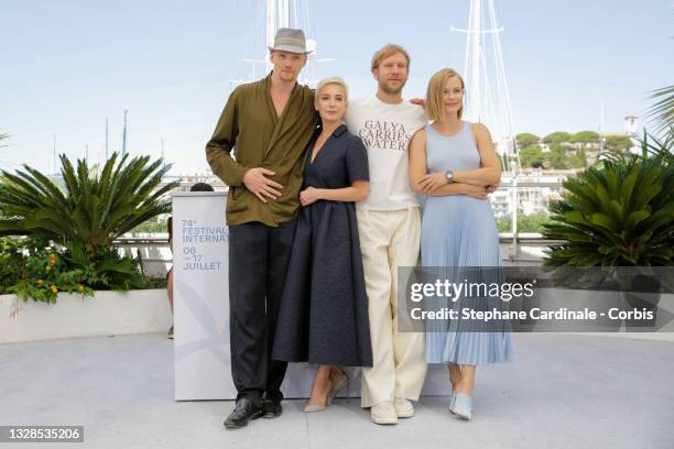 Yury Kolokolnikov, Chulpan Khamatova, Ivan Dorn and Yulia Peresild attend the "Petrov's Flu" photocall during the 74th annual Cannes Film Festival on...