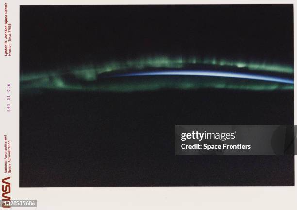 Earth observation taken onboard Atlantis, Orbiter Vehicle 104, is of the Aurora Australis or Southern Lights. The green appearing auroral activity...