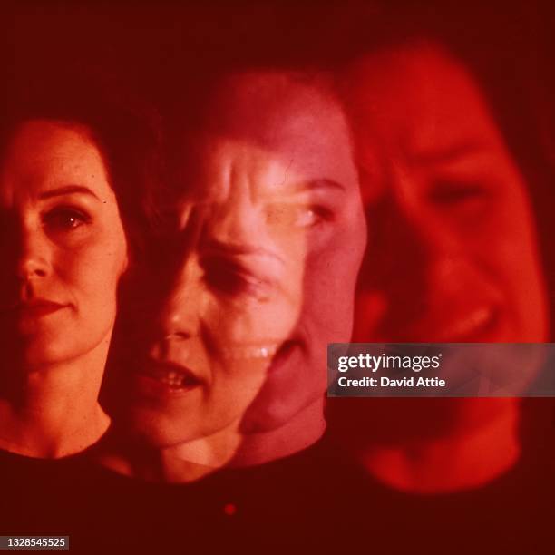 An artistic photo montage of a troubled or stressed-looking woman in January 1969 in New York City, New York.