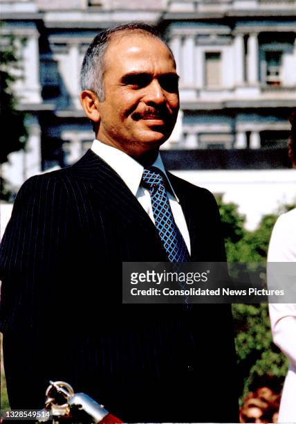 View of King Hussein I of Jordan as he listens during an arrival ceremony in his honor on the White House's South Lawn, Washington DC, April 25, 1977.