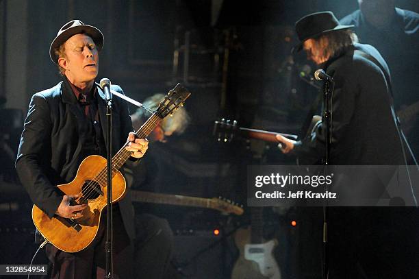 Inductee Tom Waits and Neil Young perform onstage at the 26th annual Rock and Roll Hall of Fame Induction Ceremony at The Waldorf=Astoria on March...