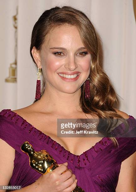 Actor Natalie Portman poses in the press room during the 83rd Annual Academy Awards held at the Kodak Theatre on February 27, 2011 in Los Angeles,...