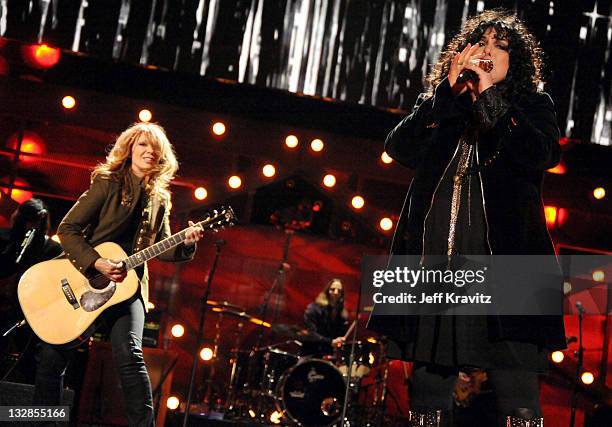 Musicians Nancy Wilson and Ann Wilson of Heart perform onstage during "VH1 Divas Salute the Troops" presented by the USO at the MCAS Miramar on...