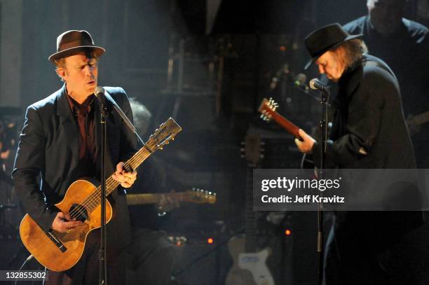 Inductee Tom Waits and Neil Young perform onstage at the 26th annual Rock and Roll Hall of Fame Induction Ceremony at The Waldorf=Astoria on March...