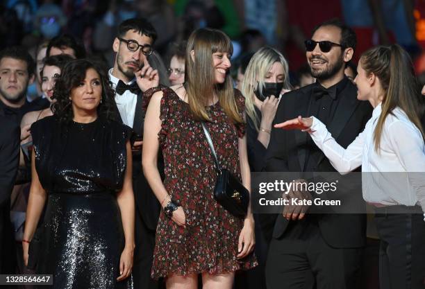 Kaouther Ben Hania, Alice Winocour, Sameh Alaa and Tuva Novotny attend the "Titane" screening during the 74th annual Cannes Film Festival on July 13,...