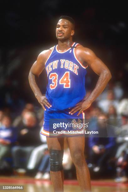 Charles Oakley of the New York Knicks looks on during a NBA basketball game against the Washington Bullets at the Capital Centre on February 22, 1990...