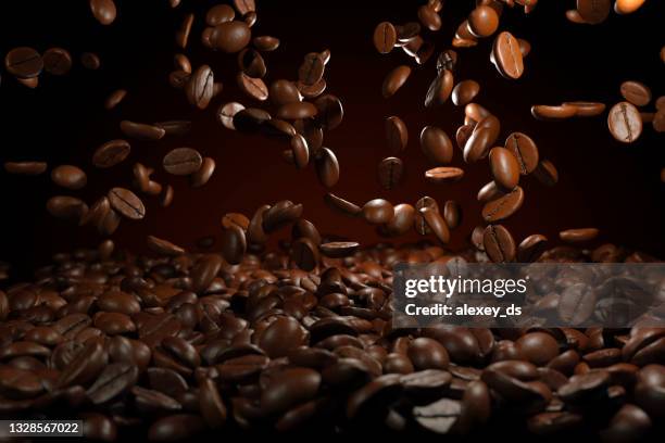 falling roasted coffee beans on brown background - coffee bean bildbanksfoton och bilder