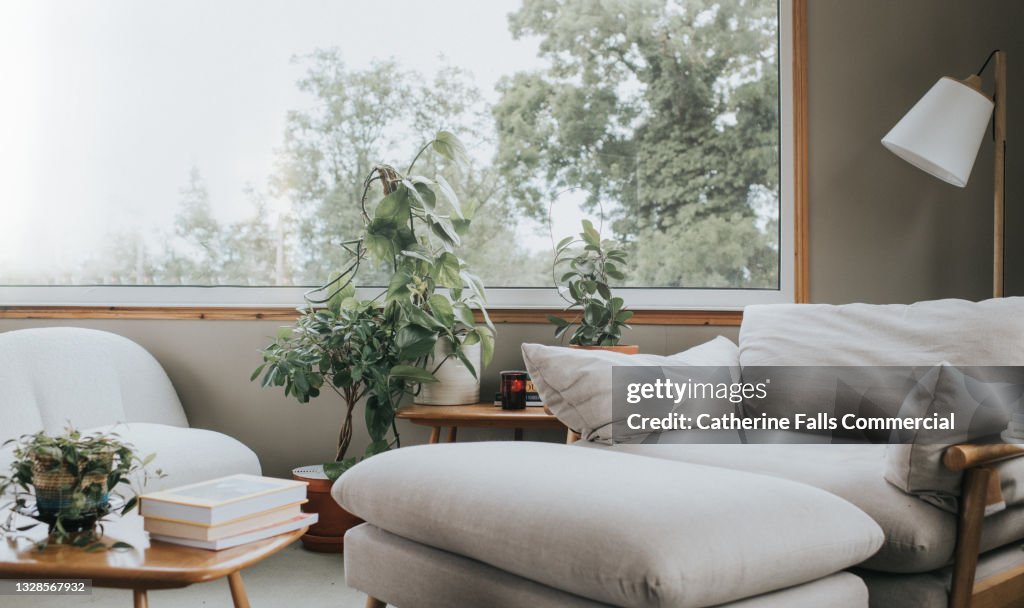 Stylish Home Interior with a large window and modern furniture