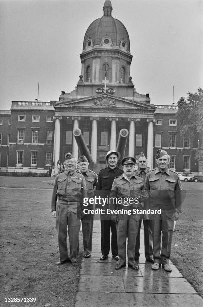 The cast of the television show 'Dad's Army' visit the Imperial War Museum in London, UK, to see an exhibition on the Second World War Home Guard,...