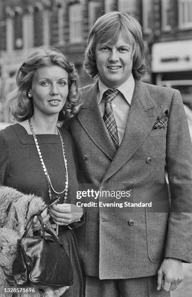 Swedish racing driver Ronnie Peterson and his girlfriend attend the wedding of British racing driver James Hunt and model Suzy Miller at Brompton...
