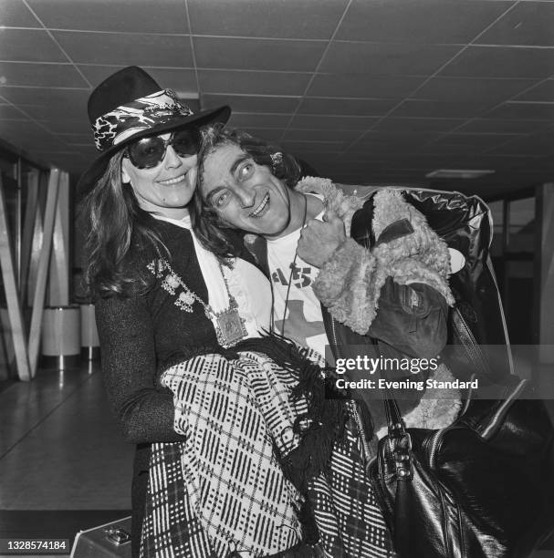 British actor and comedian Marty Feldman with his wife Lauretta at Heathrow Airport in London, UK, 18th November 1974.