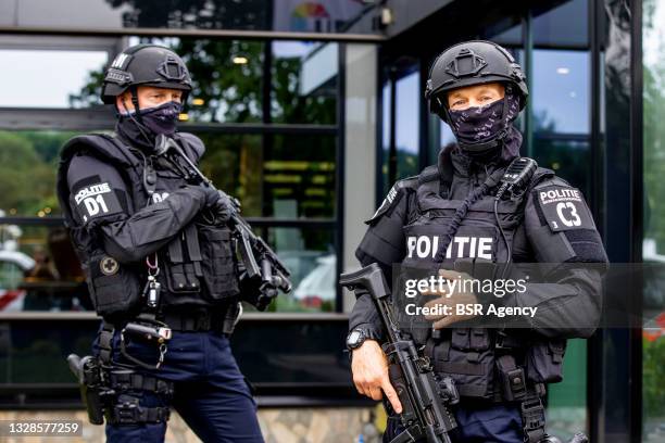 Heavily armed security police forces are seen guarding the television studios at the Media Park on July 13, 2021 in Hilversum, Netherlands. Unknown...