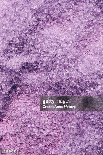background made of purple bath salt. concept of body care. flat lay style - bath salt ストックフォトと画像
