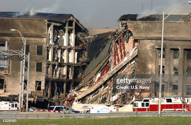 Foot gash exposes interior sections of the Pentagon following a suspected terrorist crash of a hijacked commercial airliner into the Pentagon...