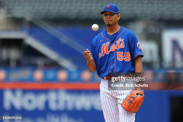 Pitcher Carlos Carrasco of the New York Mets throws off the mound to live batters before game one of a double header against the Pittsburgh Pirates...