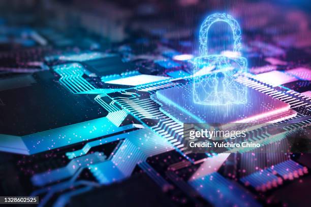 security padlock operating on the electronic circuit cpu - cybersecurity stock-fotos und bilder