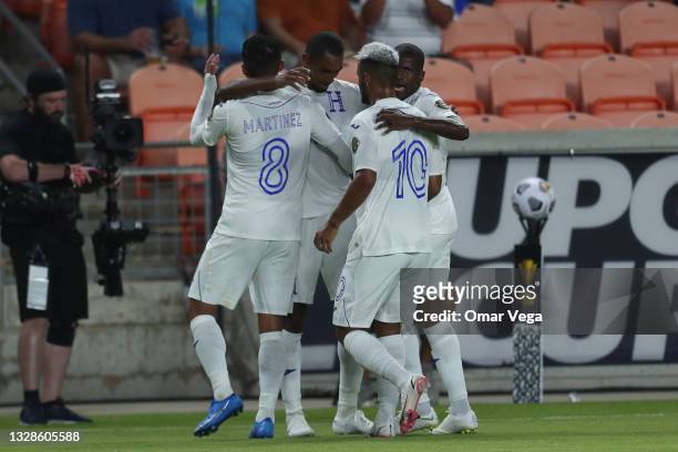 Jerry Bengtson of Honduras celebrates with his teammates aftyer scoreing 1st goal during a Group D match between Honduras and Grenada as part of 2021...