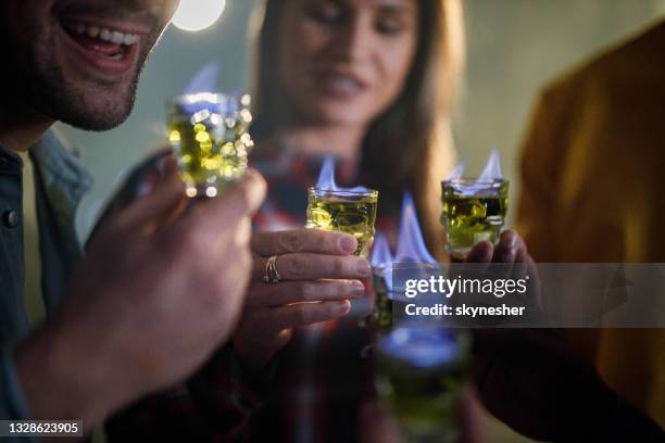 burning shots of alcohol! - absinthe stock pictures, royalty-free photos & images