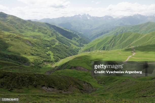 view from datvis jvari pass, caucasus mountains, georgia - argenberg stock pictures, royalty-free photos & images